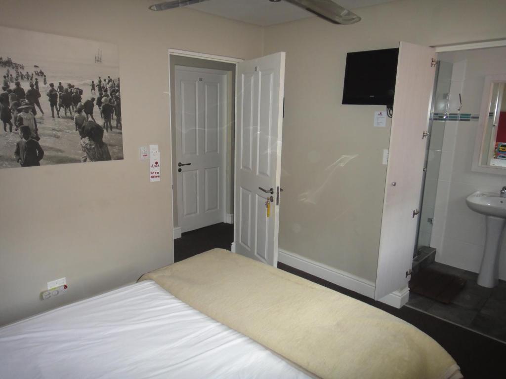 Ashanti Lodge Green Point Кейптаун Номер фото